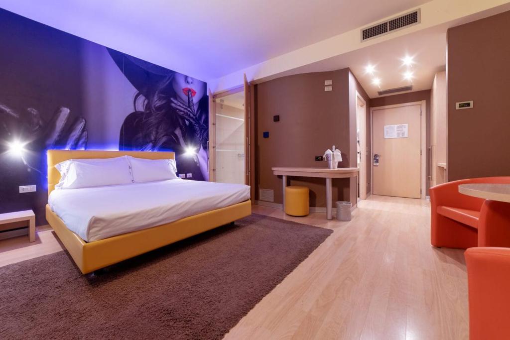Postel nebo postele na pokoji v ubytování Motel Hotel Piranha
