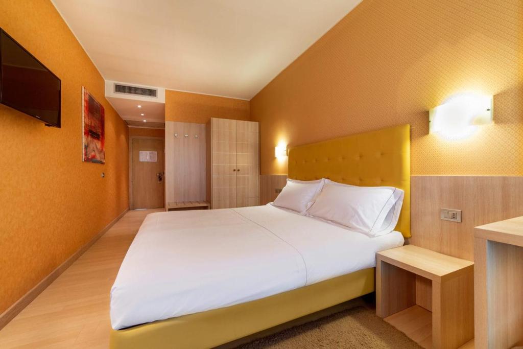 Postel nebo postele na pokoji v ubytování Motel Hotel Piranha