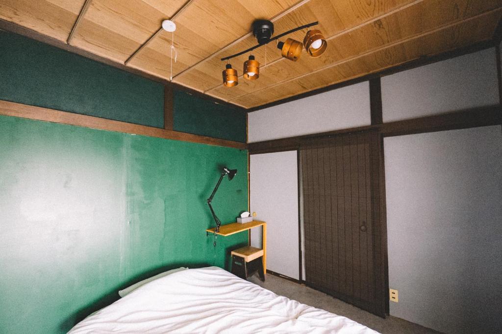 Postel nebo postele na pokoji v ubytování guesthouse TANDEM