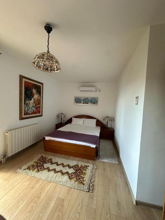 Voodi või voodid majutusasutuse Meridian Hotel toas