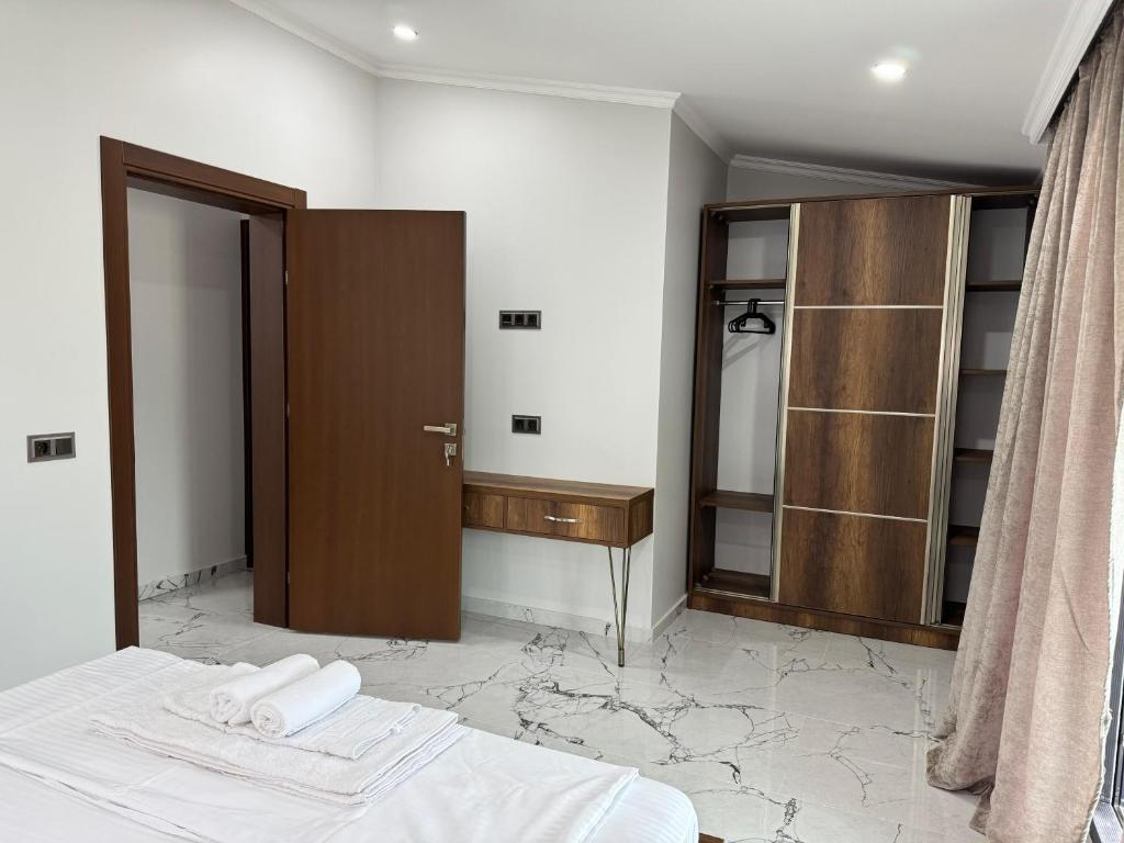 Postel nebo postele na pokoji v ubytování Magnetiti Hotel