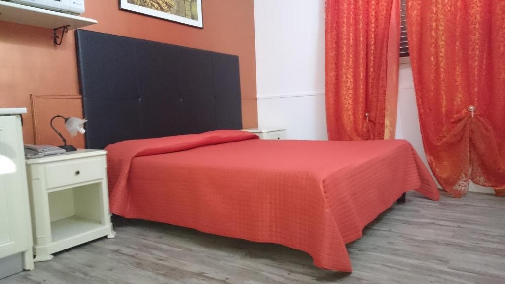 Posteľ alebo postele v izbe v ubytovaní Villa Scaduto Residence