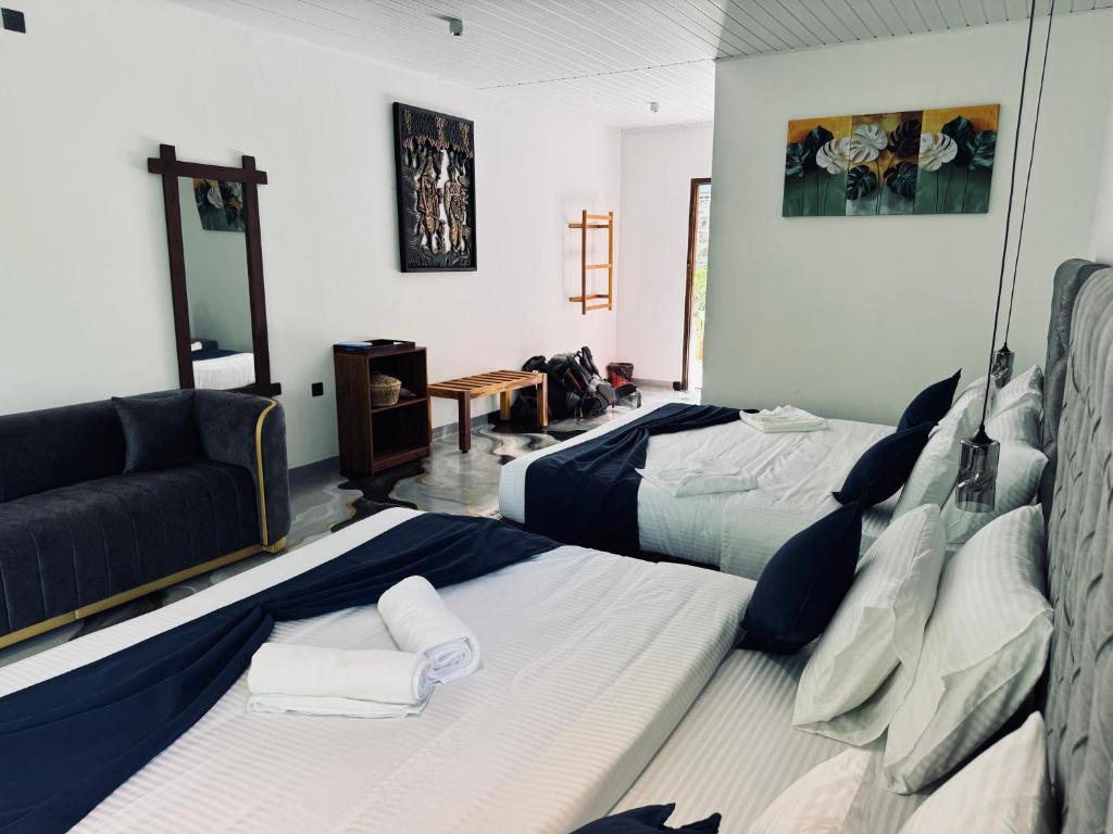 Postel nebo postele na pokoji v ubytování River Splendour Home Stay