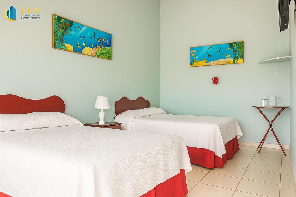 Postel nebo postele na pokoji v ubytování Hotel Divisamar by LHR