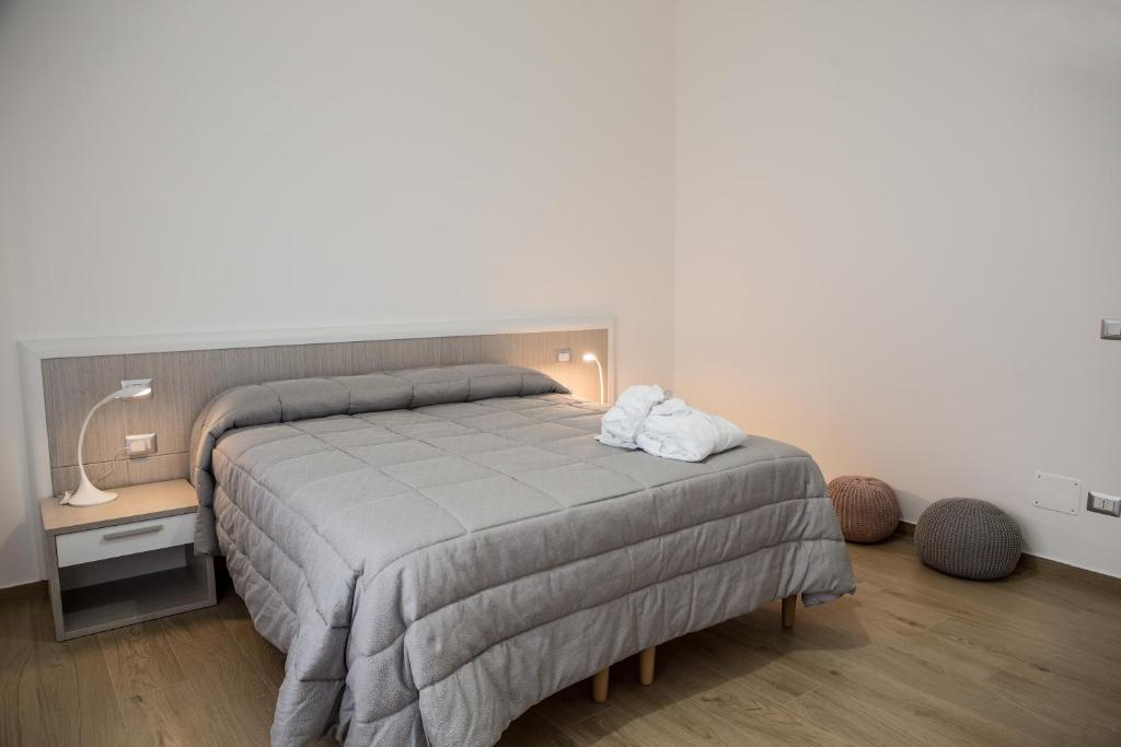 Posteľ alebo postele v izbe v ubytovaní B&B Aries