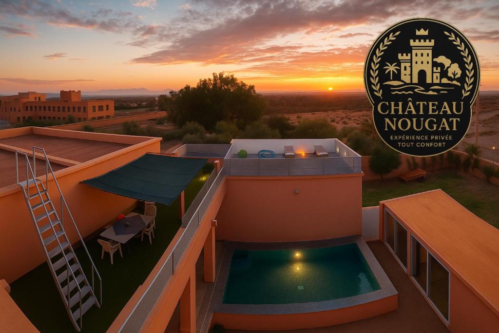 マラケシュにあるChateau Nougat, Marrakechの夕暮れ時のシャトー・ノレクトの屋上の眺め