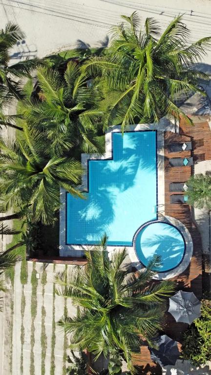 A piscina localizada em Pousada Toca da Praia ou nos arredores