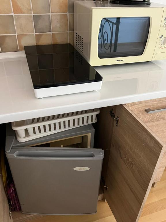 Kuchyňa alebo kuchynka v ubytovaní Zaži Apartmány Fatrapark Hrabovo