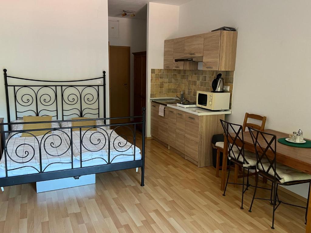 Kuchyňa alebo kuchynka v ubytovaní Zaži Apartmány Fatrapark Hrabovo
