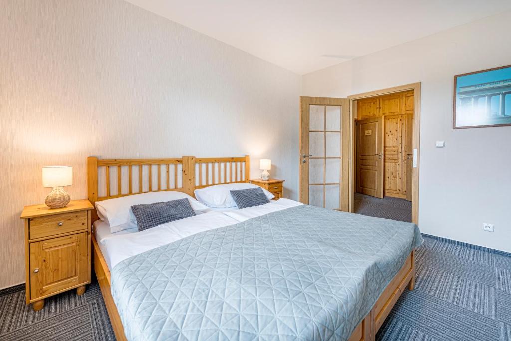 Letto o letti in una camera di Hotel Pavlov