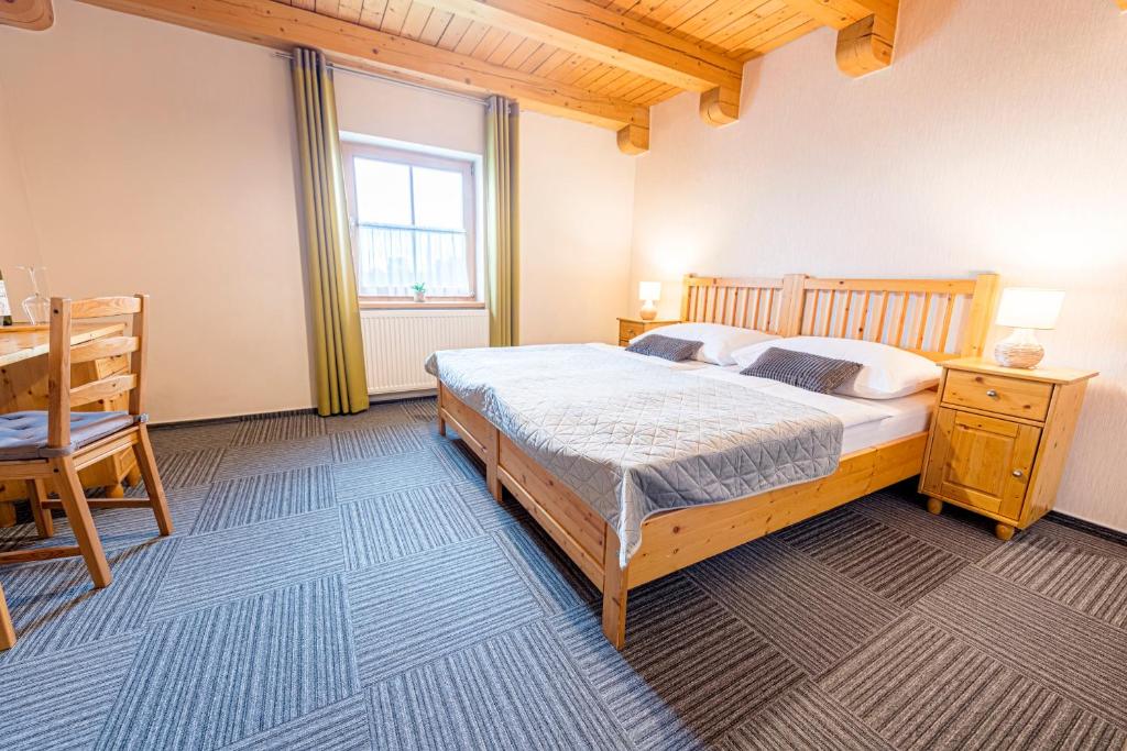 Letto o letti in una camera di Hotel Pavlov