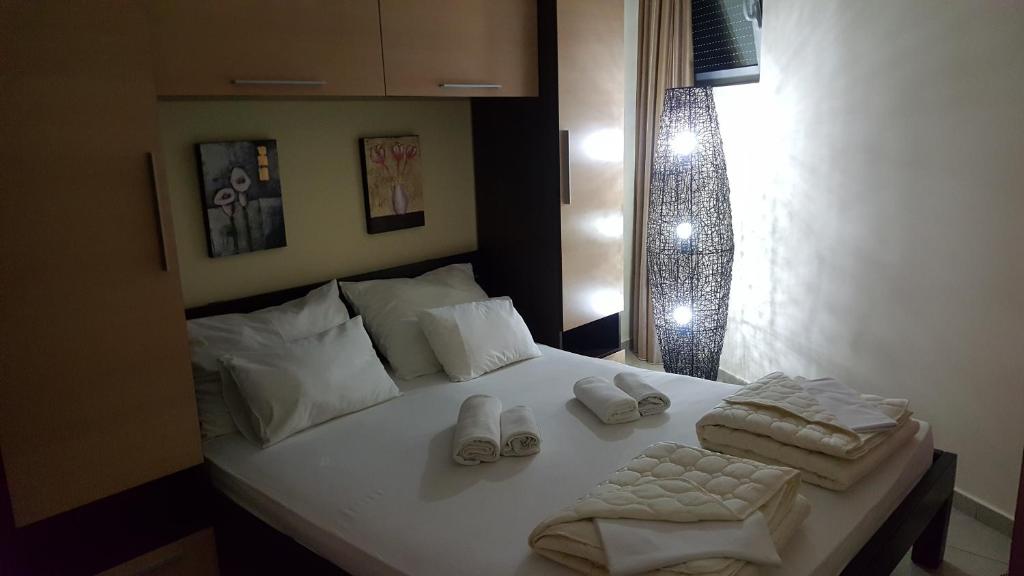 Postel nebo postele na pokoji v ubytování Apartments Rino Lux