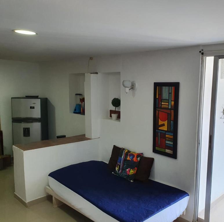 Giường trong phòng chung tại Apartamento con balcon p13