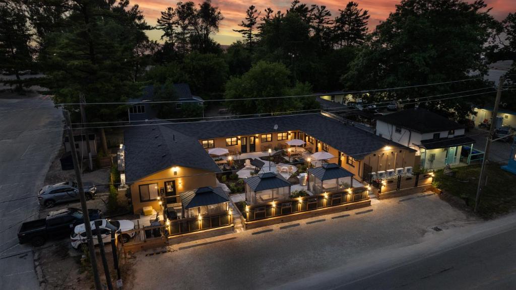 an aerial view of a house with lights at Adrian's Suites 2 Bedroom Family Suite in Wasaga Beach