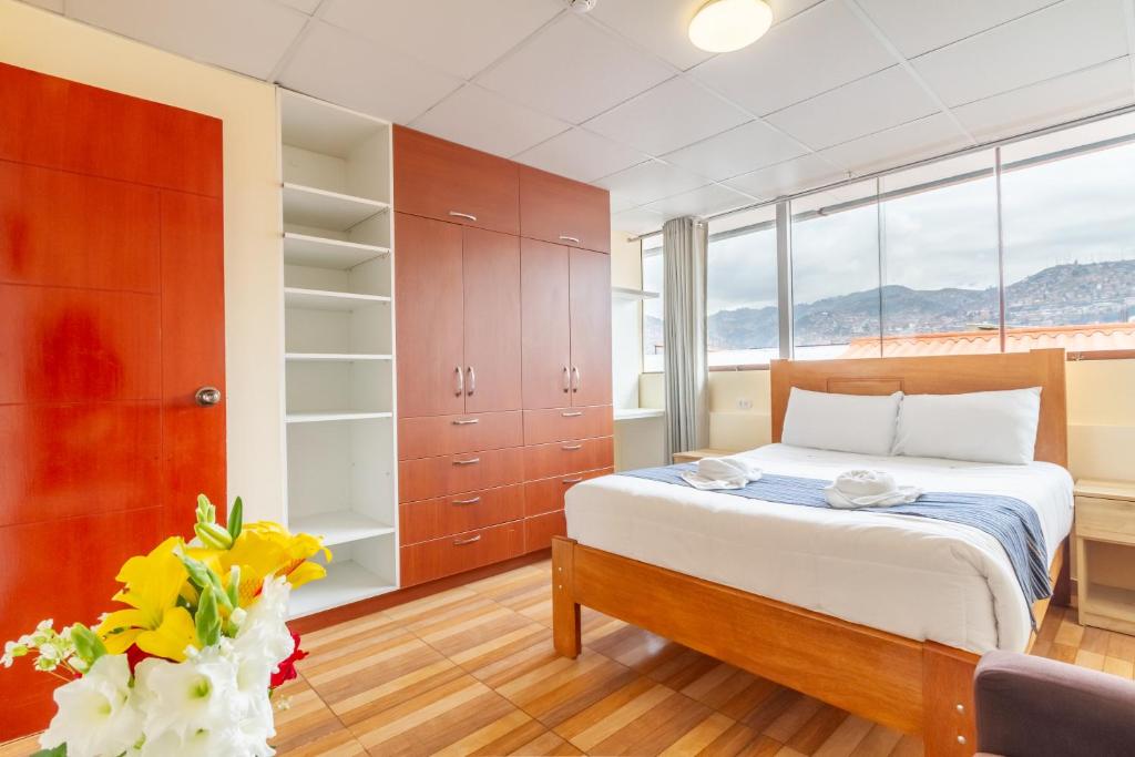 Postel nebo postele na pokoji v ubytování Cusco Hostal Qolla Wasi-II