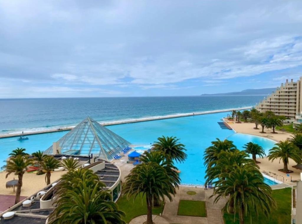 a view of the pool at the paradiso resort at San Alfonso del Mar Faro 702 in Algarrobo