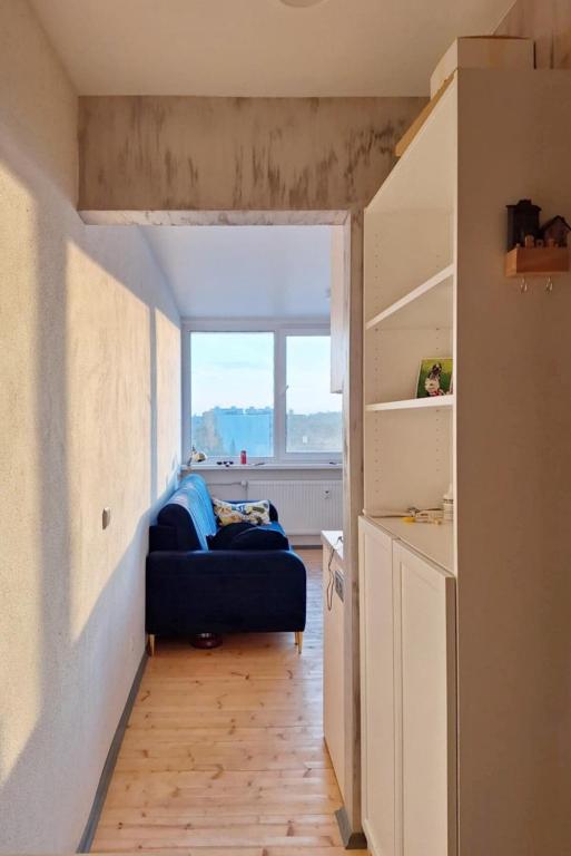 Llit o llits en una habitació de Cozy studio apartment