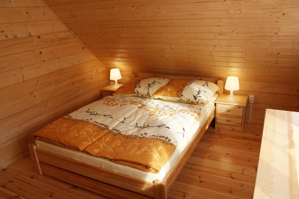 Postel nebo postele na pokoji v ubytování Domek z Bala Pod Żaglami