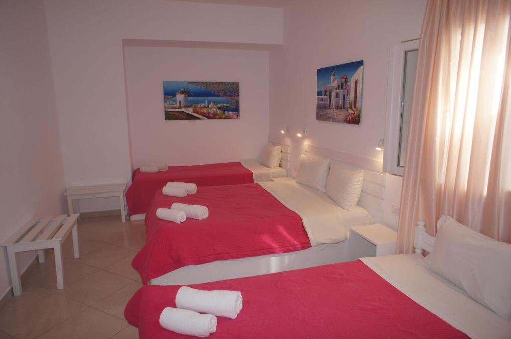 Postel nebo postele na pokoji v ubytování Hotel Milena