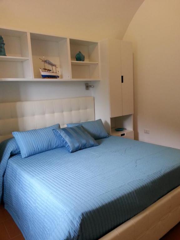 Кровать или кровати в номере Casa Vacanze Bouganvillea