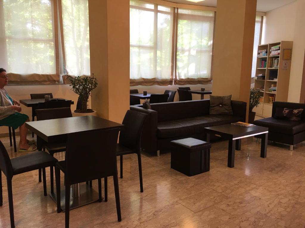 Posezení v ubytování Hotel Plutone