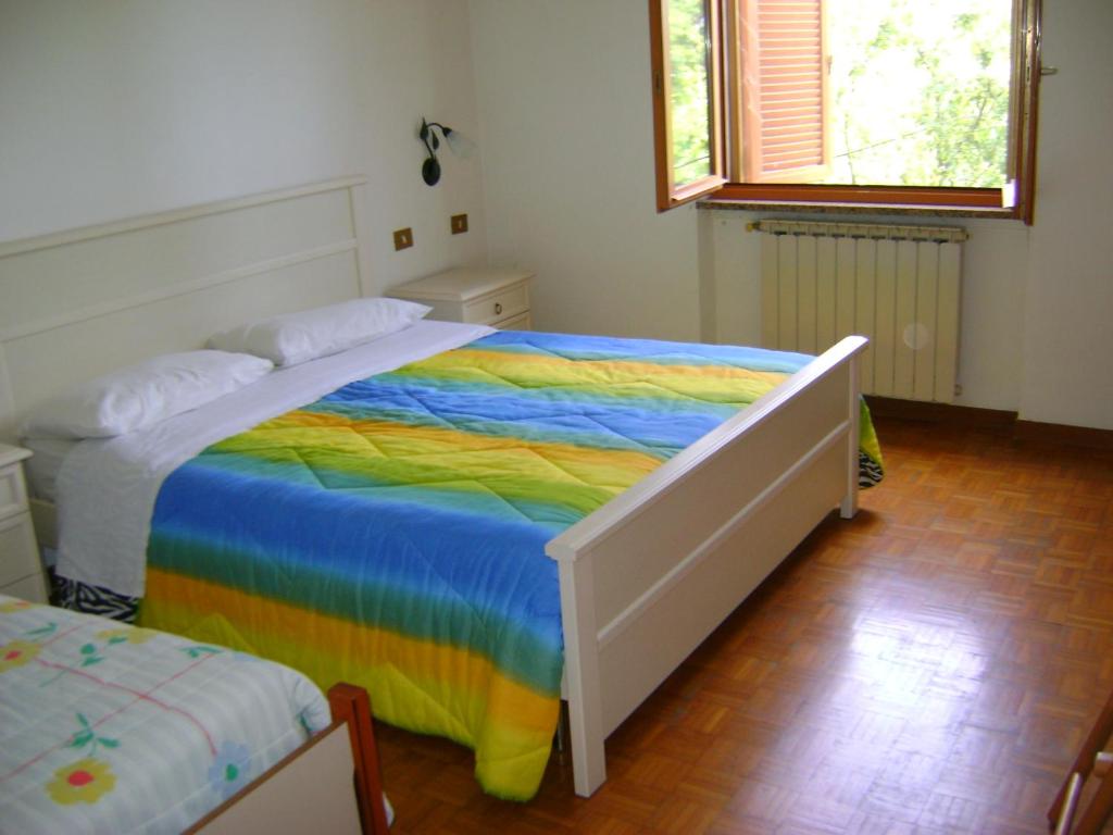 Postel nebo postele na pokoji v ubytování B&B La Mimosa