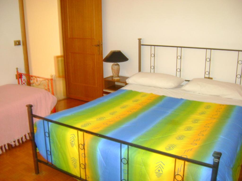 Postel nebo postele na pokoji v ubytování B&B La Mimosa