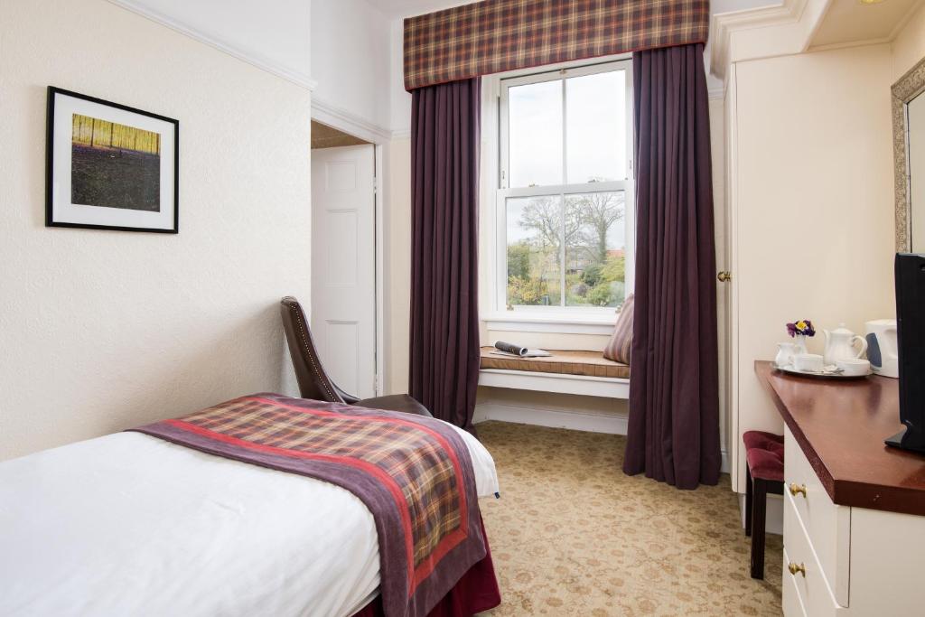 The Dunstanburgh Castle Hotel 객실 침대
