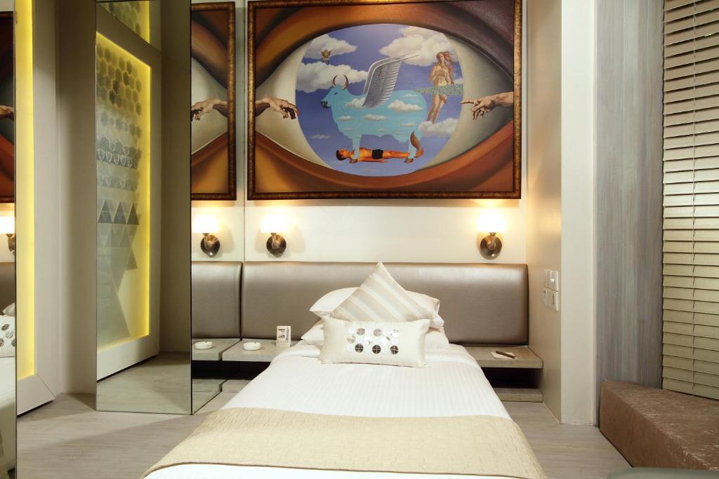 Postel nebo postele na pokoji v ubytování Le Sutra Hotel, Khar, Mumbai
