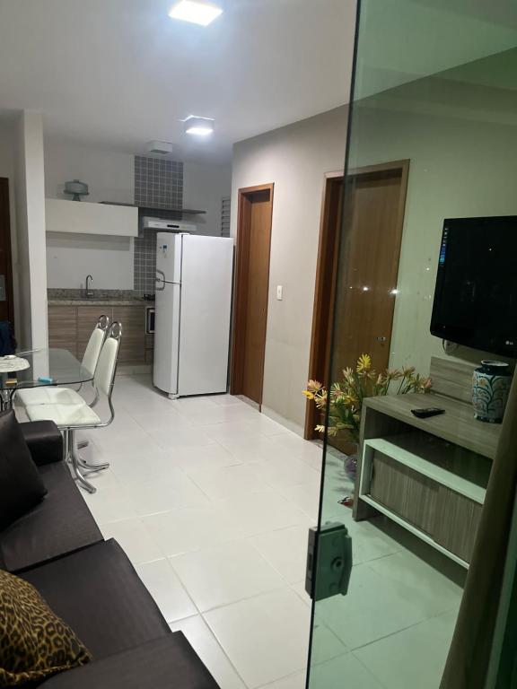 Kuchyň nebo kuchyňský kout v ubytování Caldas Novas - apartamento