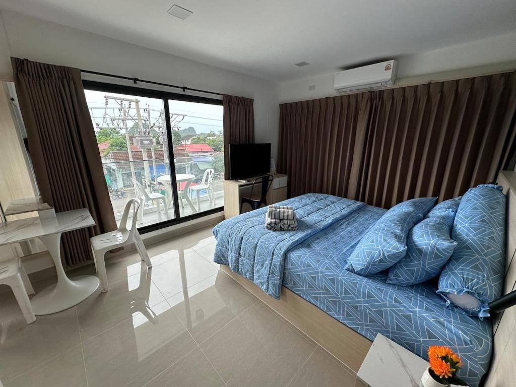 Ένα ή περισσότερα κρεβάτια σε δωμάτιο στο Apartment Blue Sands