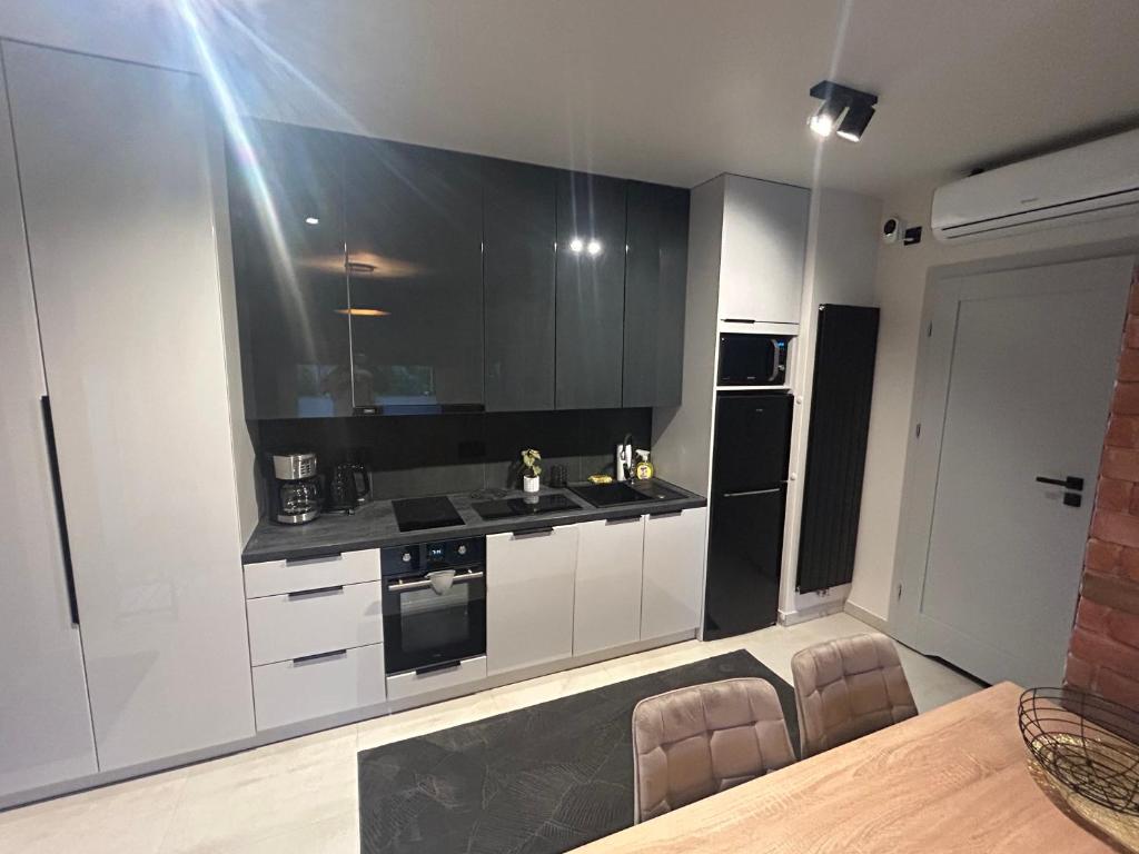 Kuchyň nebo kuchyňský kout v ubytování Apartament Jastrzębia Góra 12 B