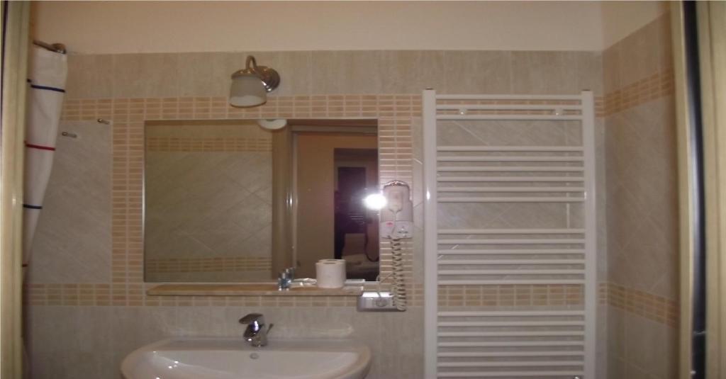 Koupelna v ubytování Hotel Elide