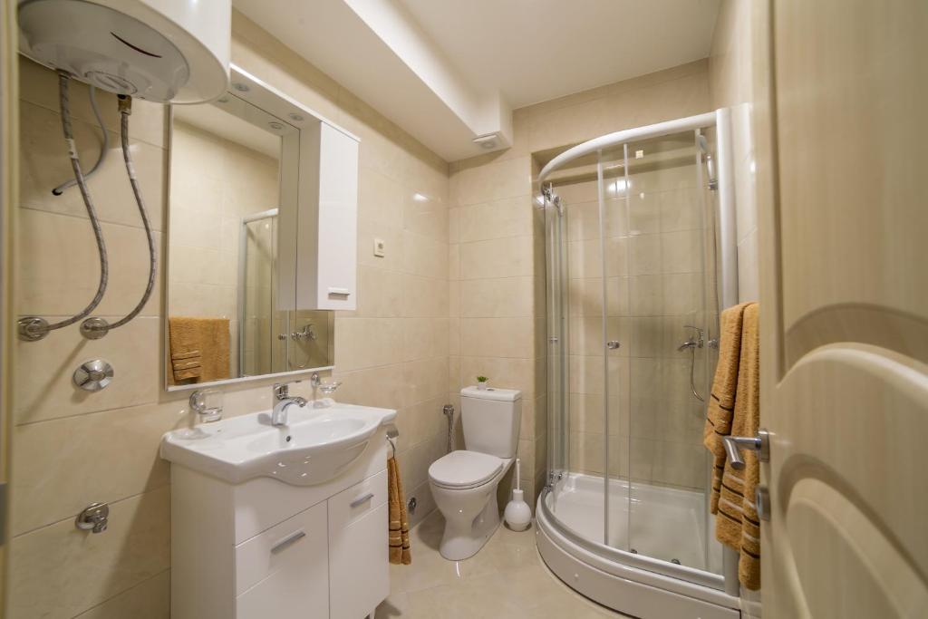 Koupelna v ubytování Milara Apartments