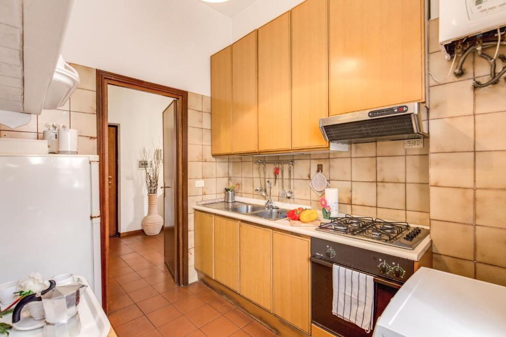 Kuchyň nebo kuchyňský kout v ubytování Finally in Rome