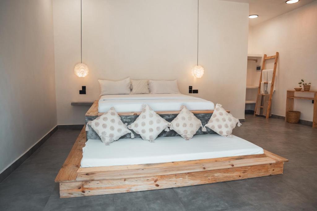 Postel nebo postele na pokoji v ubytování Maisha Matamu Beach Hotel Paje