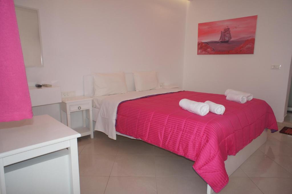 Postel nebo postele na pokoji v ubytování Hotel Milena