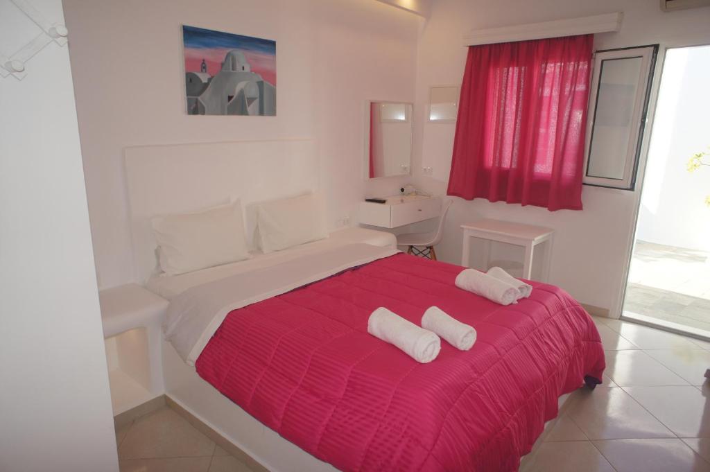 Postel nebo postele na pokoji v ubytování Hotel Milena