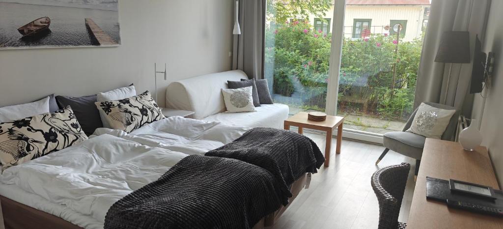 Postel nebo postele na pokoji v ubytování Nösundsgården Hotell & Vandrarhem