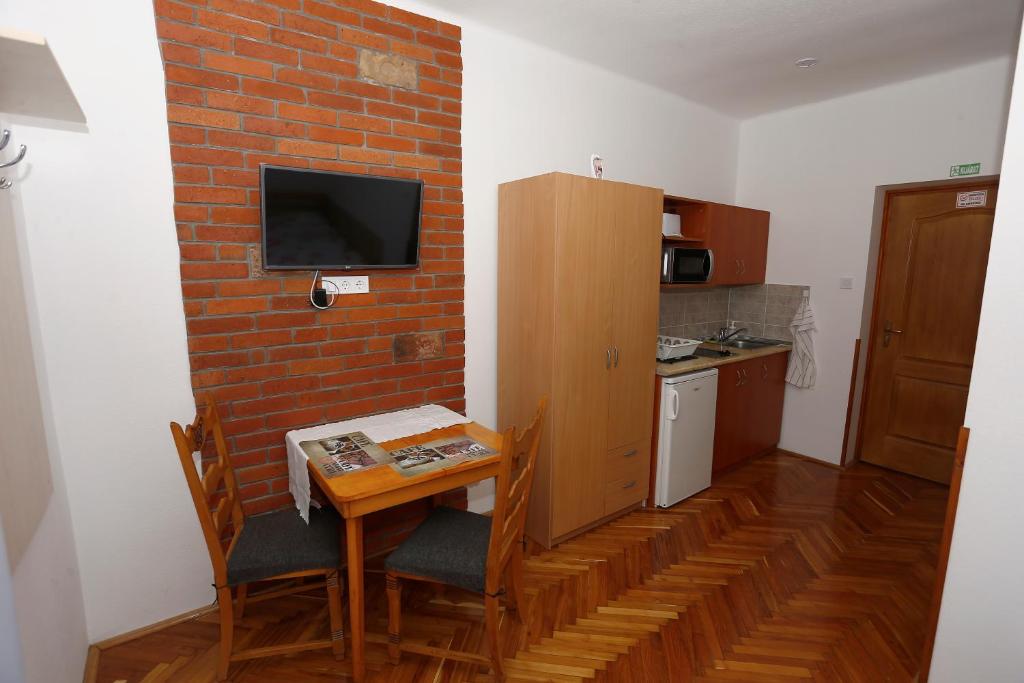 Kuchyň nebo kuchyňský kout v ubytování Total Relax Apartmanház