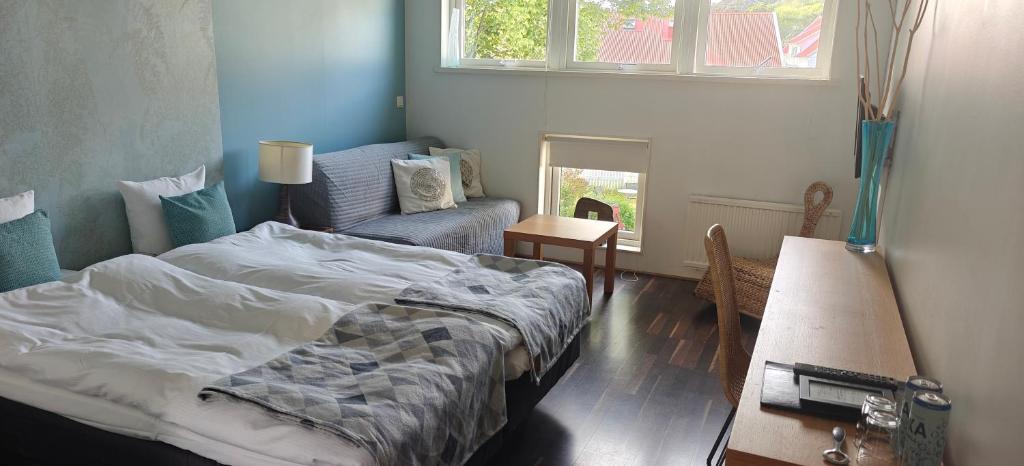 Postel nebo postele na pokoji v ubytování Nösundsgården Hotell & Vandrarhem