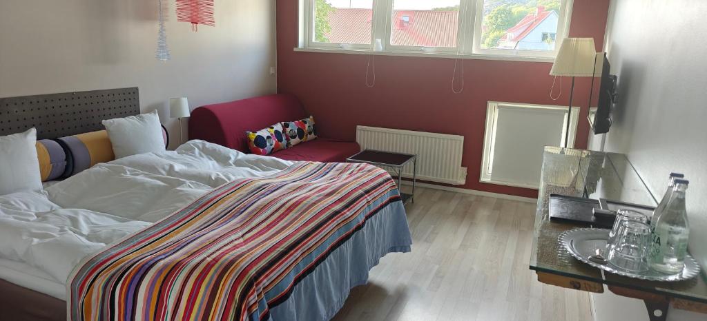Postel nebo postele na pokoji v ubytování Nösundsgården Hotell & Vandrarhem