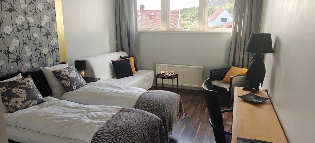 Postel nebo postele na pokoji v ubytování Nösundsgården Hotell & Vandrarhem