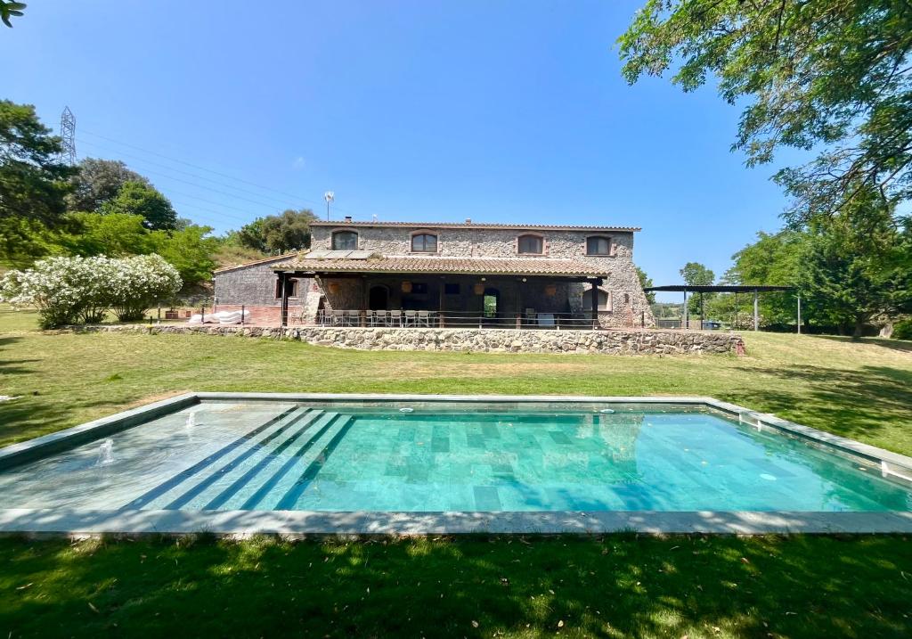 Πισίνα στο ή κοντά στο MASIA PUIG PIQUÉ - Piscina, jardín, porcho, BBQ, WIFI - 20 PERSONAS