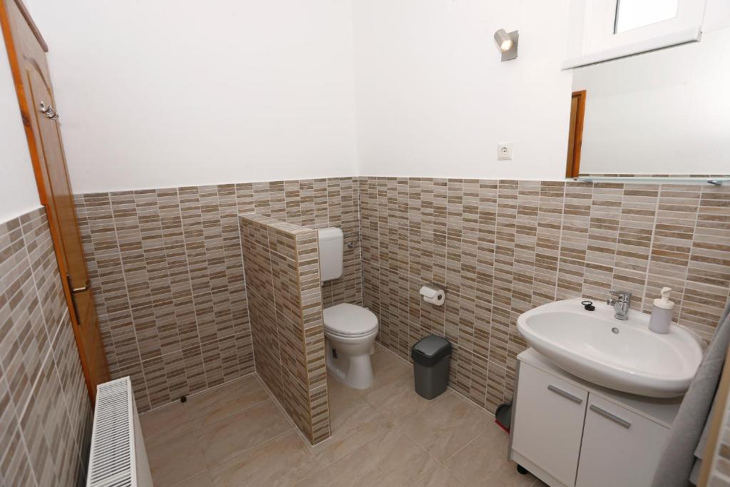 Koupelna v ubytování Total Relax Apartmanház