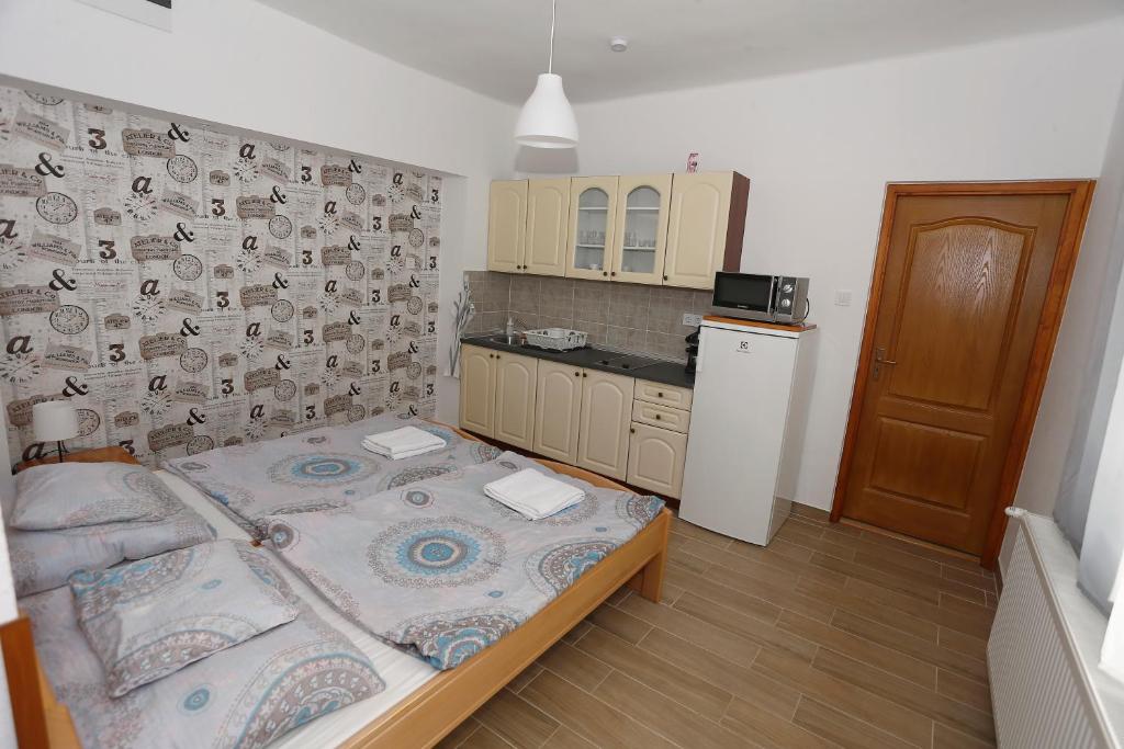 Kuchyň nebo kuchyňský kout v ubytování Total Relax Apartmanház