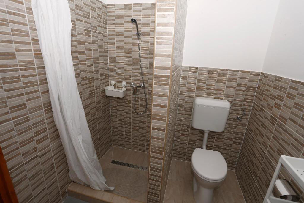 Koupelna v ubytování Total Relax Apartmanház