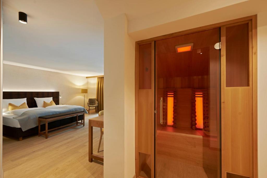 Postel nebo postele na pokoji v ubytování Après Post Hotel