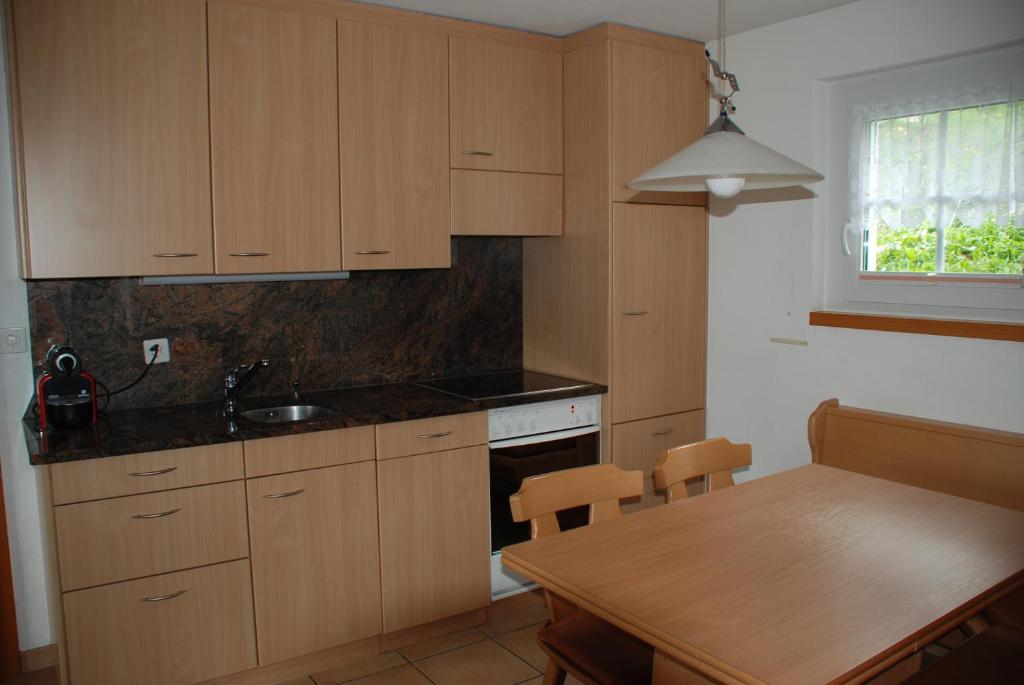 Kuchyň nebo kuchyňský kout v ubytování Chalet Foresta