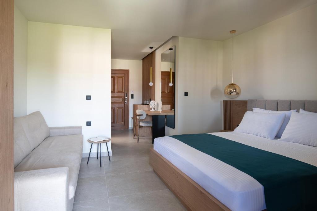 Postel nebo postele na pokoji v ubytování Hotel Pontos